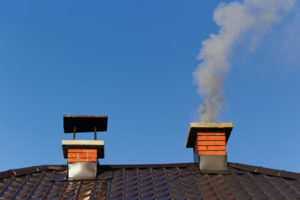 two chimneys on rooftop